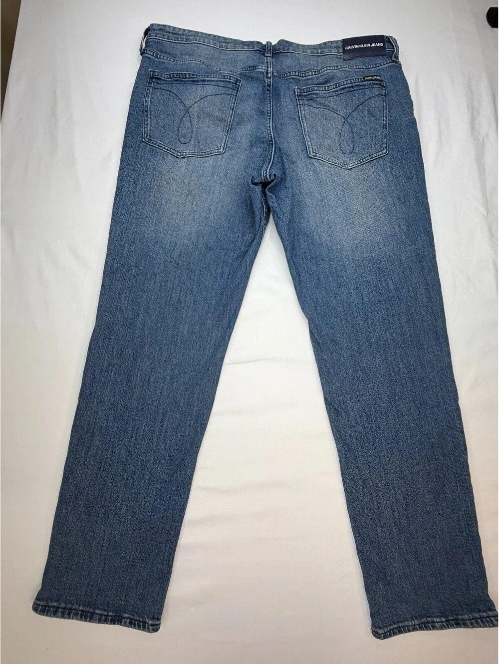 Calvin Klein Men's Jeans Slim Straight Medium Wash Mid Rise Solid Size 38 Blue